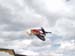 superman seat grab in clouds